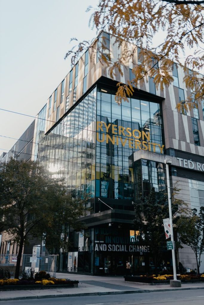 Exterior view of the Ryerson University building in Toronto, showcasing modern architecture with glass facades.
